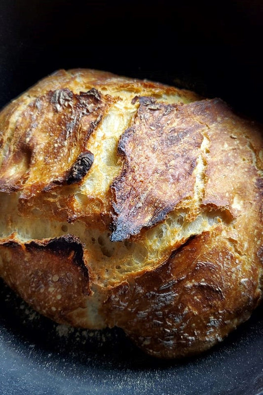 Bread baked at home in a cast iron dutch oven by Crisbee